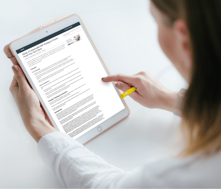 Woman on Ipad with Gartner report Woman on Ipad with Gartner report
